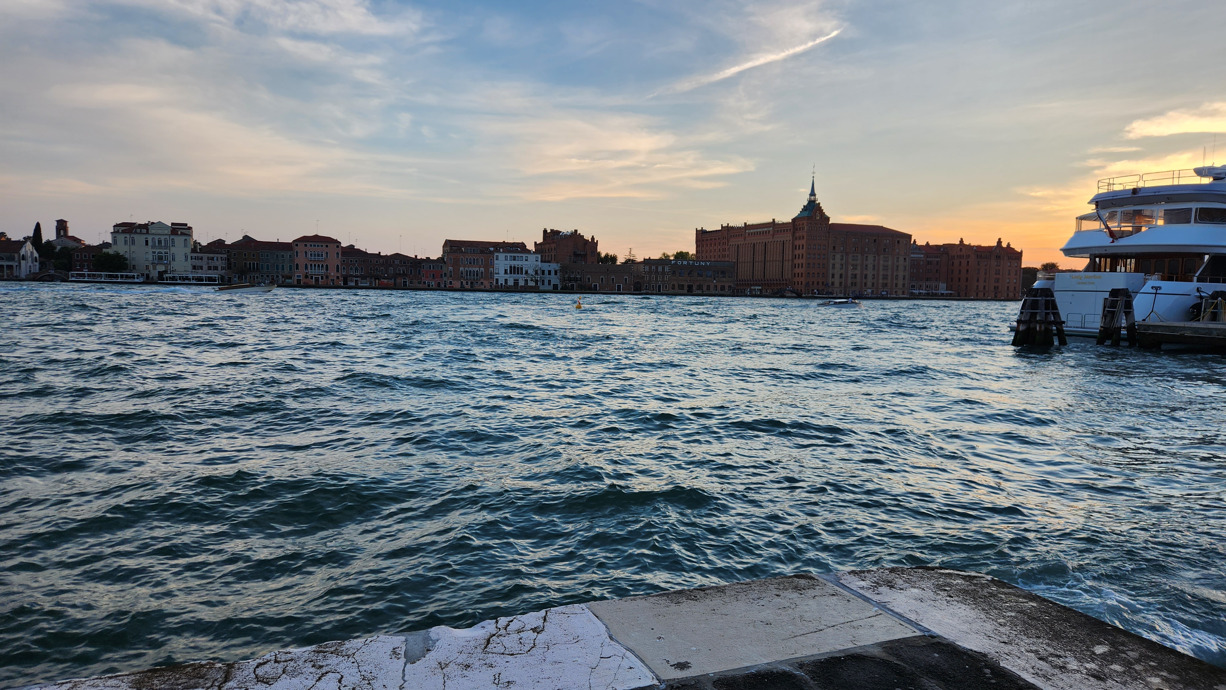 Historic Italian waterfront at sunset