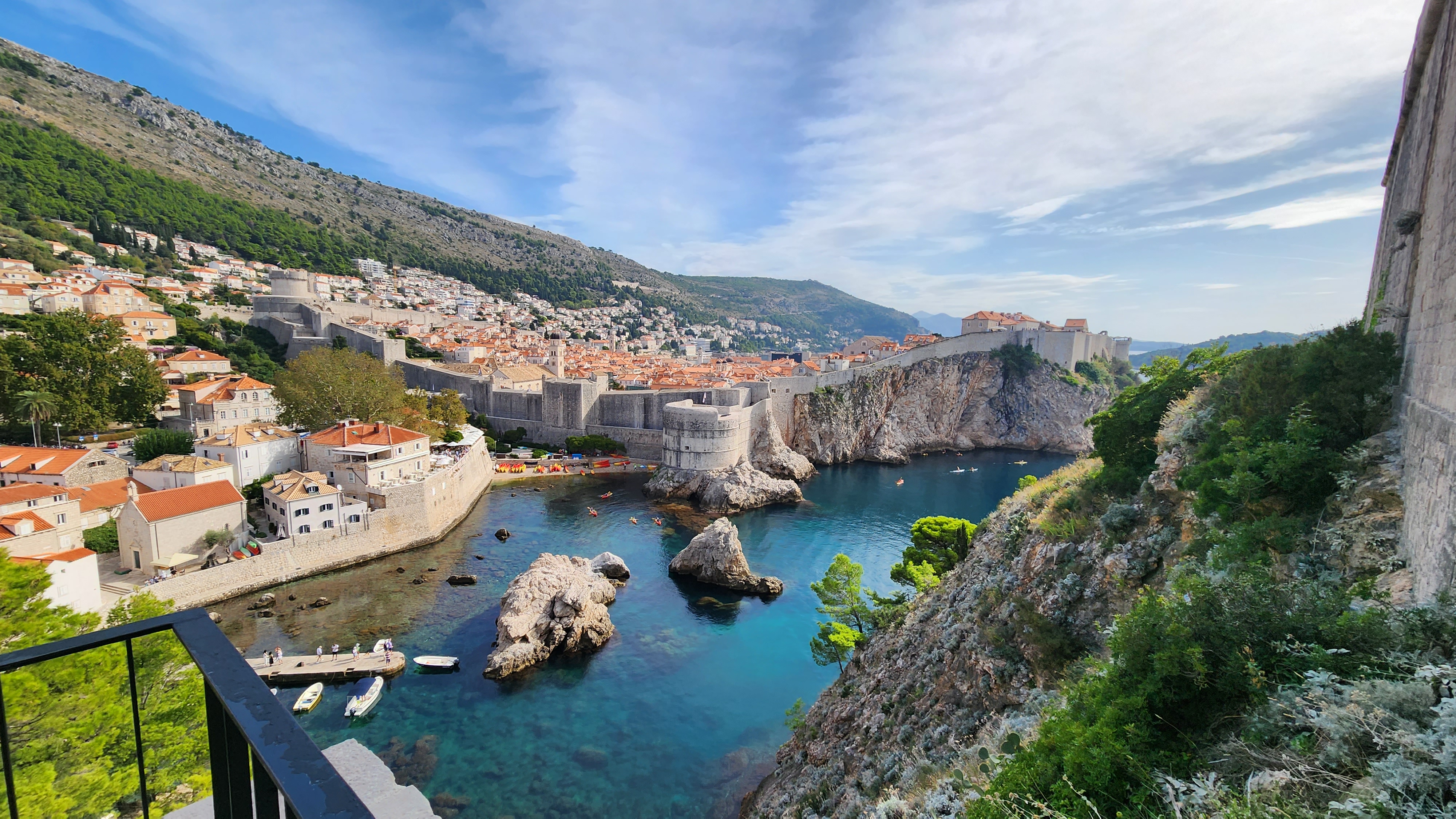 Dubrovnik city walls and blue Adriatic coastline in Croatia