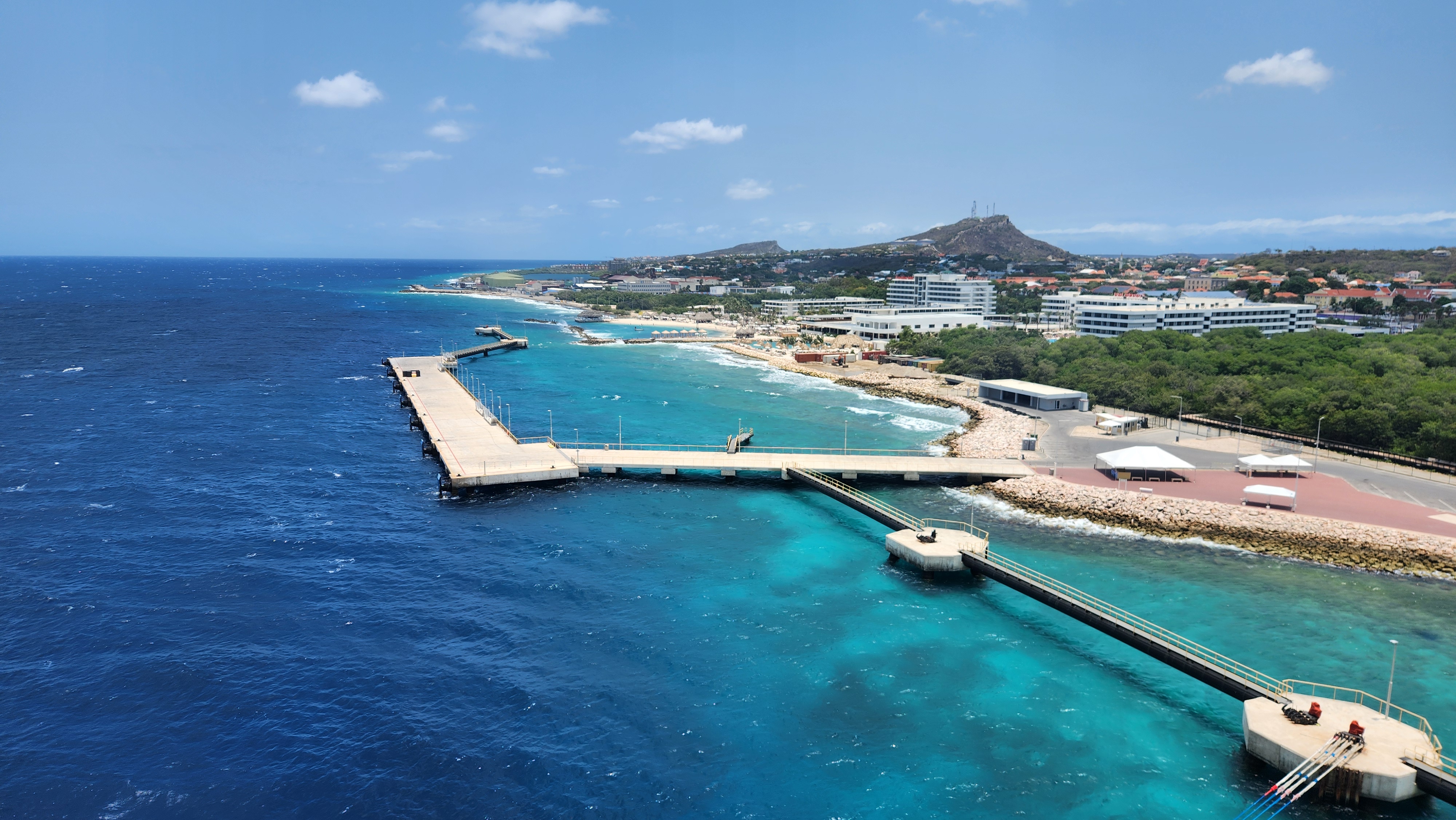 Bright Caribbean water and island coastline
