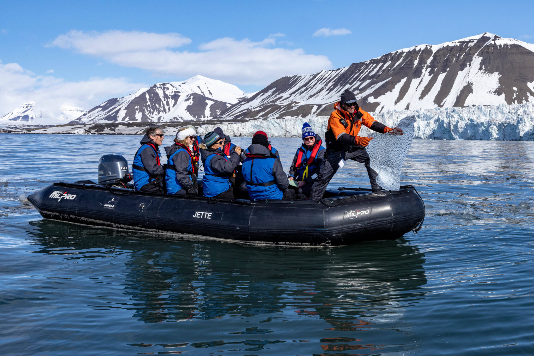 Aurora Expeditions guests Zodiac cruising in Svalbard