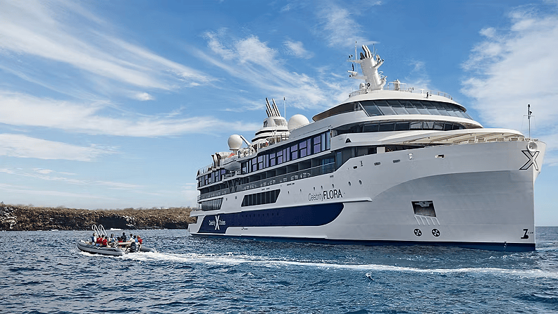 Celebrity Flora with a Zodiac expedition boat in the Galapagos