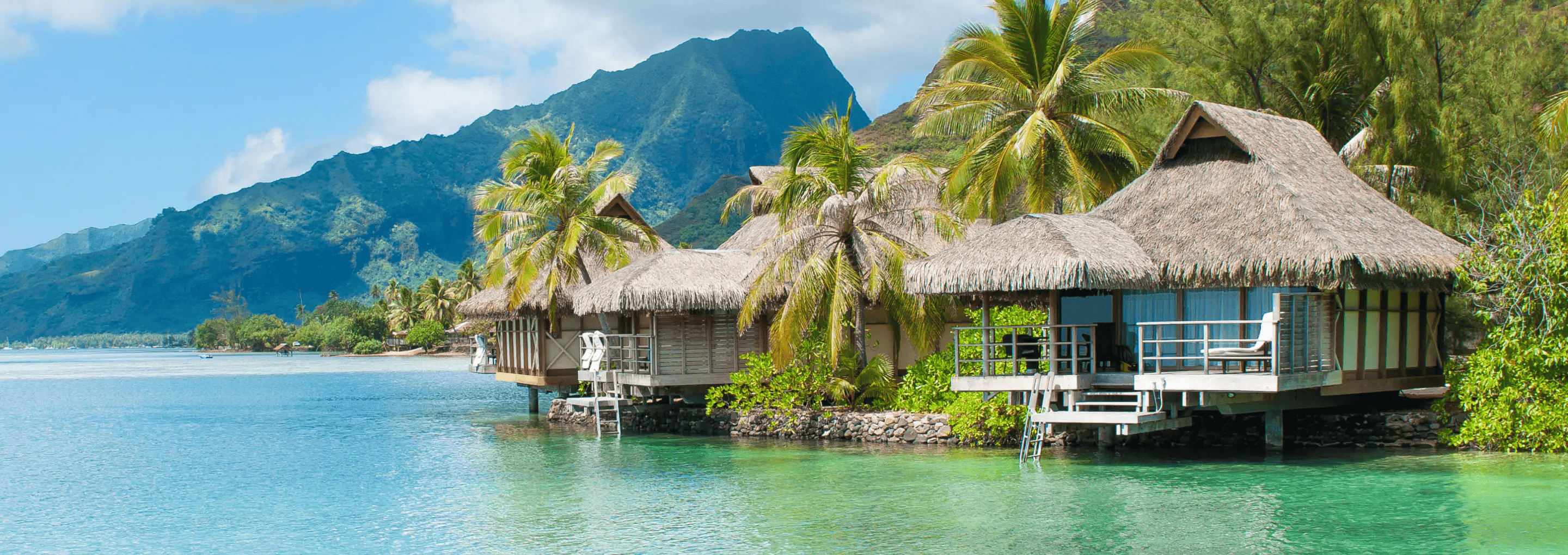 Overwater bungalows and tropical mountains in French Polynesia